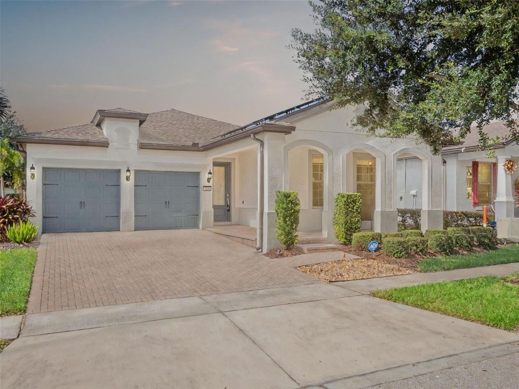 Photo of 7254 Enchanted Lake Drive, Winter Garden, FL 34787 (MLS # O6351043)