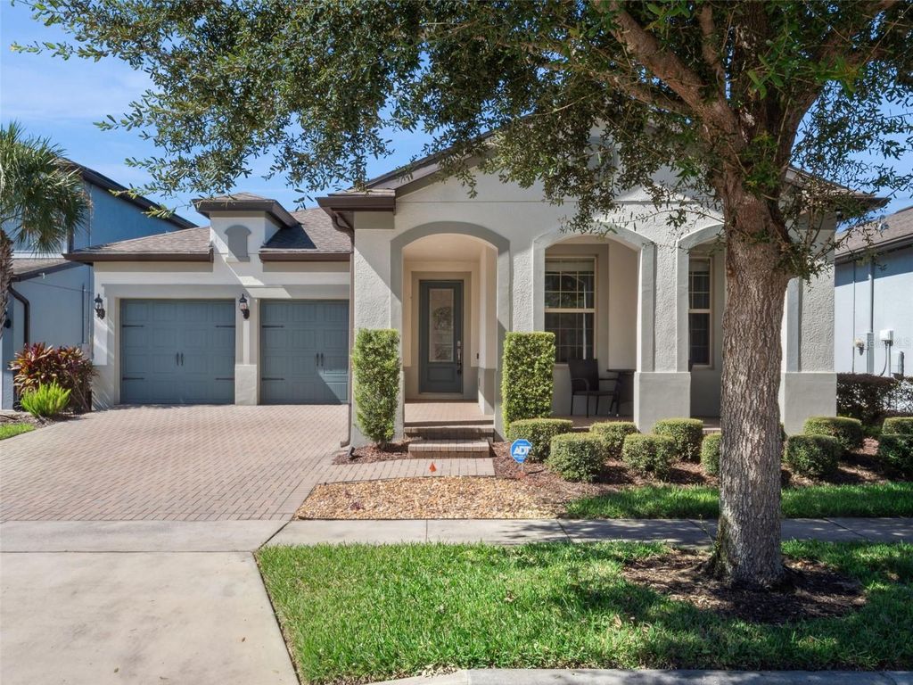 Photo of 7254 Enchanted Lake Drive, Winter Garden, FL 34787 (MLS # O6351043)