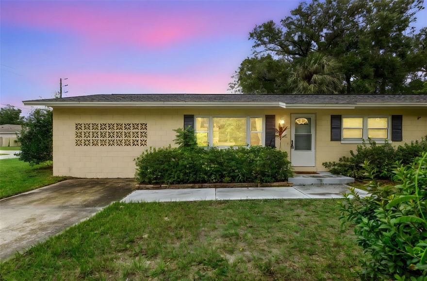 One or more photo(s) has been virtually staged. Discover timeless charm and modern comfort at 141 N McDonald Ave! This 3-bedroom, 1.5-bath DeLand home welcomes you with original hardwood floors, bright living spaces, and thoughtful updates throughout. NEW WINDOWS 2021, NEW FENCE 2023, NEW INSTALLATION IN ATTIC & NEW DUCT WORK! The kitchen boasts stainless steel appliances, crisp white cabinets, granite counters, a cozy breakfast nook, and a coffee station—perfect for your morning routine. Sliding doors from the dining room lead to a screened porch overlooking the spacious fenced backyard with mature landscaping. The primary suite offers a private entry, half bath, and two walk-in closets, while the additional bedrooms are roomy and versatile. A dedicated office with built-in bookshelves is ideal for working from home. Inside laundry room. Storage Shed for all your lawncare items. Nestled on a corner lot, this property blends privacy, character, and convenience—just minutes from vibrant Downtown DeLand. Make your appointment today to see all this home has to offer you!