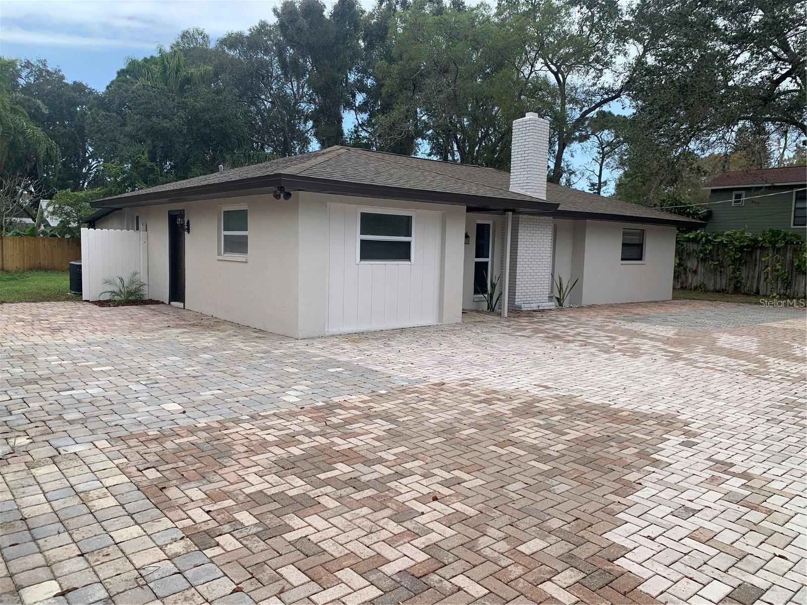 Location, location, location! This property is located in sought after Sarasota Springs. Come see this beautiful, completely remodeled and unique
bedroom, 2 bathroom block home with a wood burning fireplace. Beautiful pavers greet you as you pull into the huge driveway that can fit
multiple vehicles. Fresh paint inside and out! Completely updated kitchen with backsplash and granite countertops and both bathrooms and
vanities have been renovated. The home also has all new flooring throughout. The property is fenced including the very large backyard with
oversized lanai for plenty of privacy. Close to dining, shopping, schools, the Legacy Trail, world class beaches, UTC Mall, I75 and much, much
more!