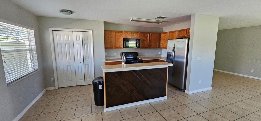 Photo of 776 Cresting Oak Circle #70, Orlando, FL 32824 (MLS # O6398336)