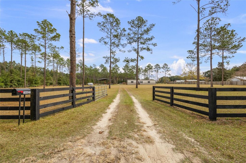 Photo of 14421 NW 214th Terrace, High Springs, FL 32643 (MLS # GC535834)