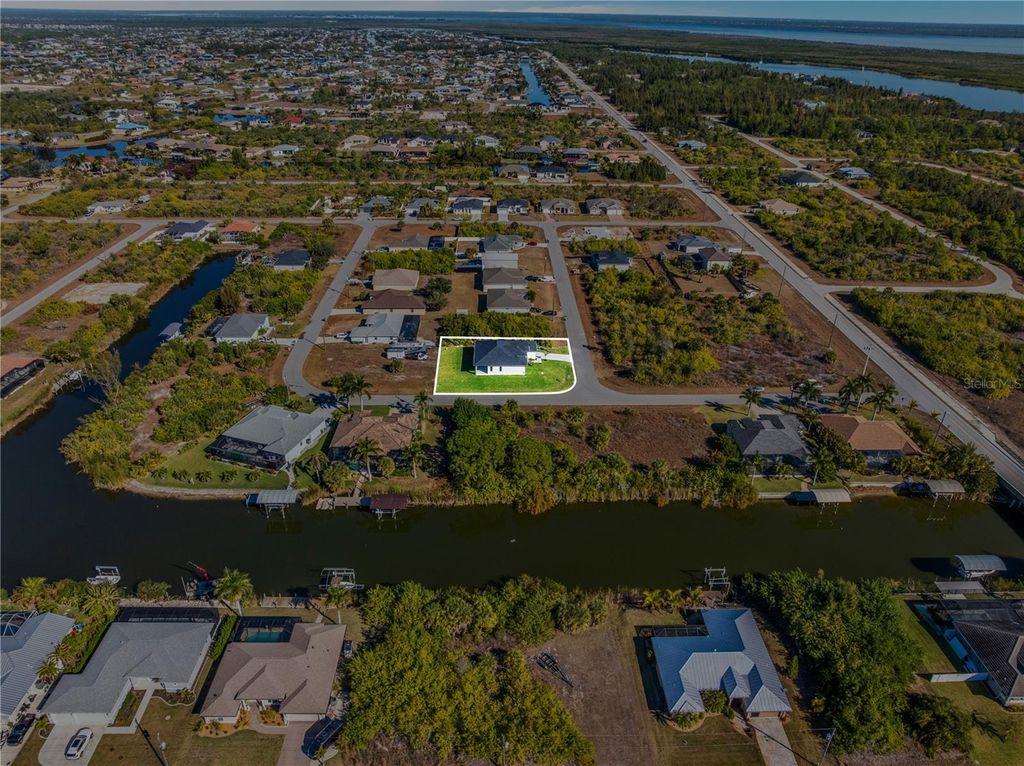 Photo of 10065 Memphis Street, Port Charlotte, FL 33981 (MLS # TB8477846)