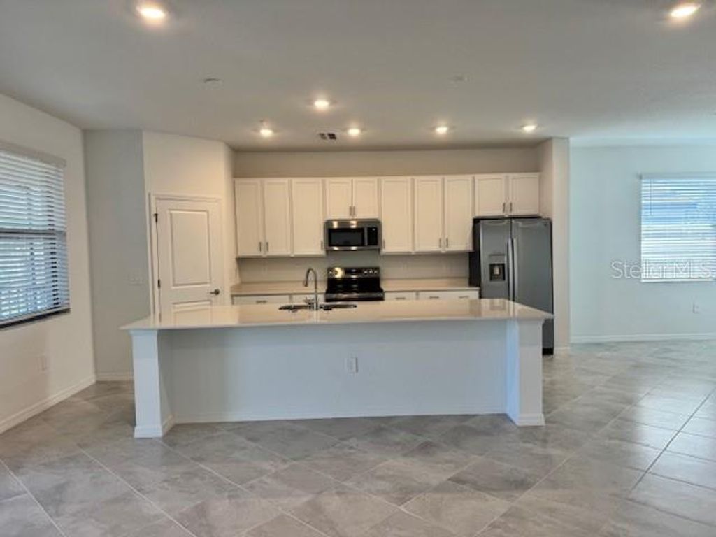 Photo of 5624 Summit Pointe Circle #103, Bradenton, FL 34210 (MLS # A4670420)