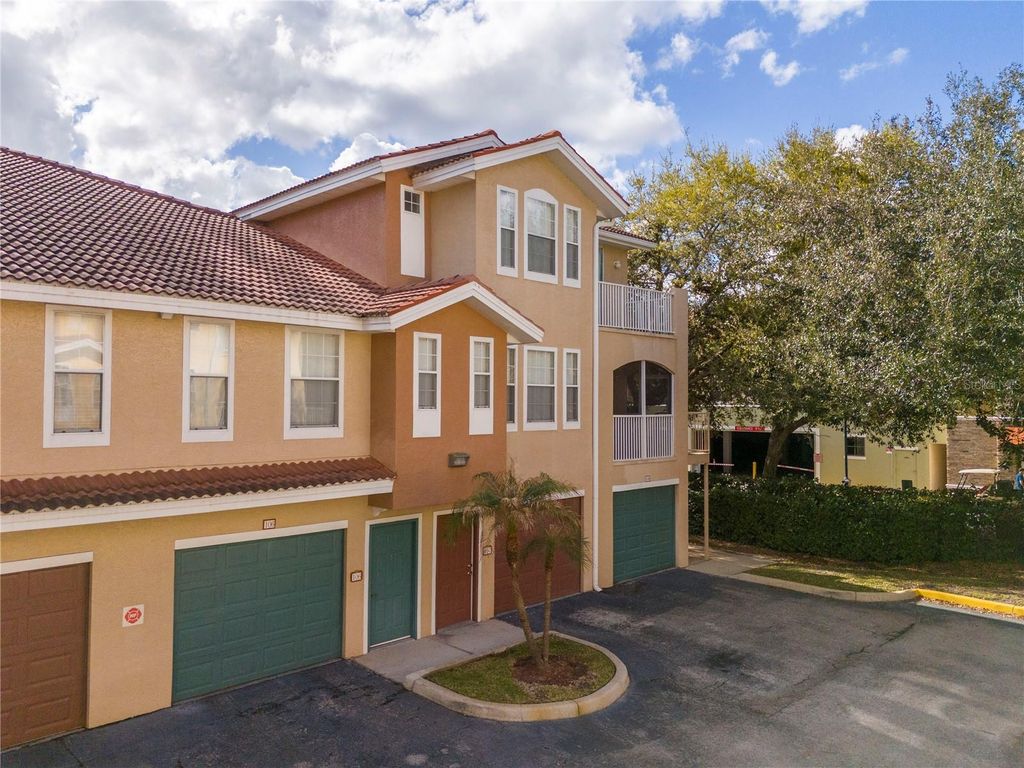 Photo of 12102 Poppy Field Lane #107, Orlando, FL 32837 (MLS # O6392501)