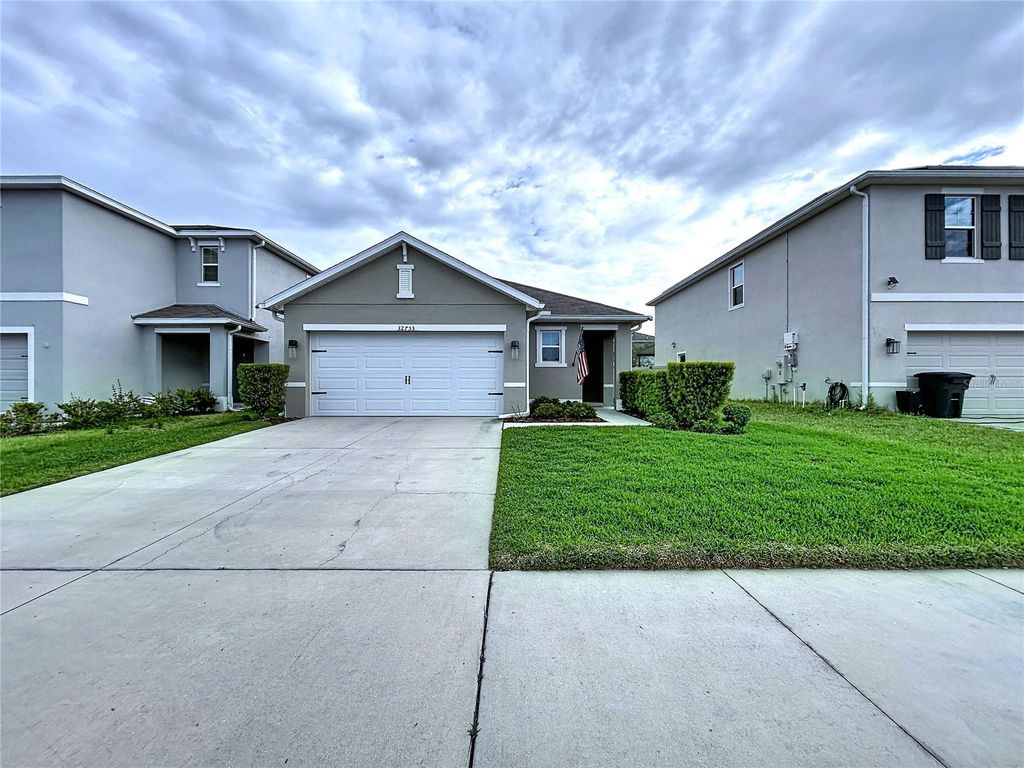 Photo of 32753 Pez Landing Lane, Wesley Chapel, FL 33543 (MLS # TB8491686)