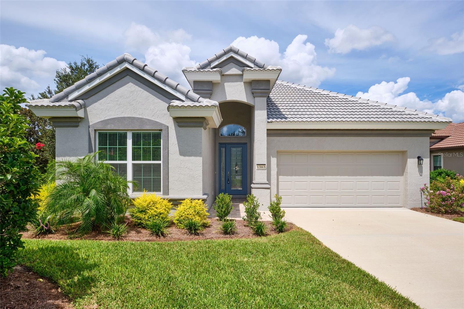One or more photo(s) has been virtually staged. New construction without the wait! Welcome to the Theresa Model in the exclusive Terra Vista at Villages of Citrus Hills, Florida’s premier 55+ master-planned golf community. This never-lived-in home offers the perfect blend of comfort, convenience, and resort-style living.
Designed with an open and thoughtful layout, the home features three spacious bedrooms and 2 ½ bathrooms, including a convenient Jack and Jill bath plus a guest half bath. Soaring 12-foot ceilings create an airy, inviting feel, while the owner’s suite bathroom is pre-wired for a sauna, offering the opportunity to design your own private spa retreat. A large walk-in utility/laundry room adds everyday function, and the extended two-car garage provides extra depth to easily accommodate a golf cart—an especially valuable feature since Terra Vista is the only community within the Villages of Citrus Hills that allows golf carts.
Perfectly situated back off of the 2nd hole green of the Skyview Golf Course, this residence captures sweeping fairway views with both privacy and tranquility. A versatile study has been fully customized into a golf room, the perfect place to showcase clubs, trophies, or even create a personal golf simulator. And if you’d prefer not to install your own, residents also have access to a community golf simulator in the Activity Center—just schedule an appointment and play year-round. The covered lanai is another highlight—already pre-plumbed and gas-wired for an outdoor kitchen, making it easy to design your dream entertaining space.
Living in Terra Vista means embracing a lifestyle unlike any other. Residents enjoy four championship golf courses, tennis and pickleball centers, outdoor heated pools, and the award-winning 50,000 sq. ft. BellaVita Spa & Fitness Complex, which offers over 250 fitness and wellness classes each month. Social life thrives with dining at the Skyview Restaurant & Bar and Grille and Tiki Bar, along with a vibrant calendar of concerts, shows, clubs, and community events.
Set in the rolling hills of Citrus County, Terra Vista combines the tranquility of the Nature Coast with easy access to Tampa, Orlando, and Ocala. This is more than a home—it’s an invitation to live the true Florida lifestyle in one of the state’s most desirable communities.