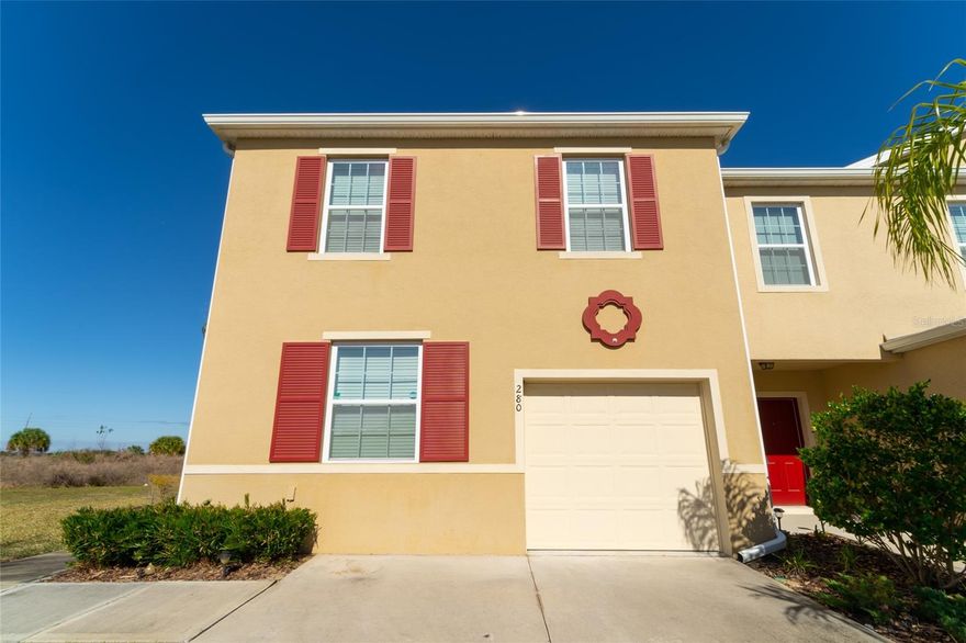 Corner townhome!  A beautifully new, well maintained, 3 bedroom, 2 and 1/2 bathroom townhome located in the stunning gated community of Lake Bluff in Davenport. Corner lot, that offers more privacy and natural light. Family Room, Dining Room and a very nice screened back porch with a beautiful pond view! Lots of natural light!  The kitchen has a breakfast bar and a nice closet pantry. Refrigerator, stove, and dishwasher are included. Upstairs a nice Master Bedroom, with Walk in Closet and a Master Bathroom that has a spacious shower and double sink vanity. There are 2 extra bedrooms and a full bath. Laundry is located upstairs and has washer and dryer included. Ceramic floor downstairs and carpet upstairs. Blinds. One car garage. The gated and secured community offers a community pool. You are going to love to live close to shops, restaurants, entertainment and schools.