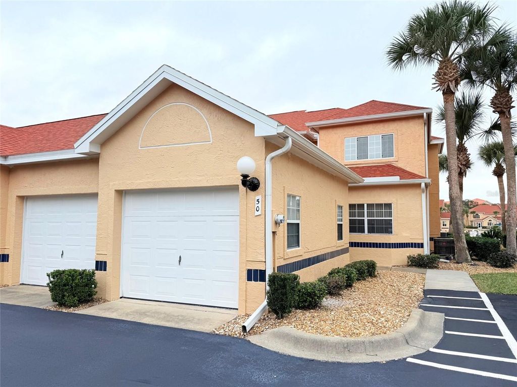 Photo of 50 Rivers Edge Lane, Palm Coast, FL 32137 (MLS # FC314570)