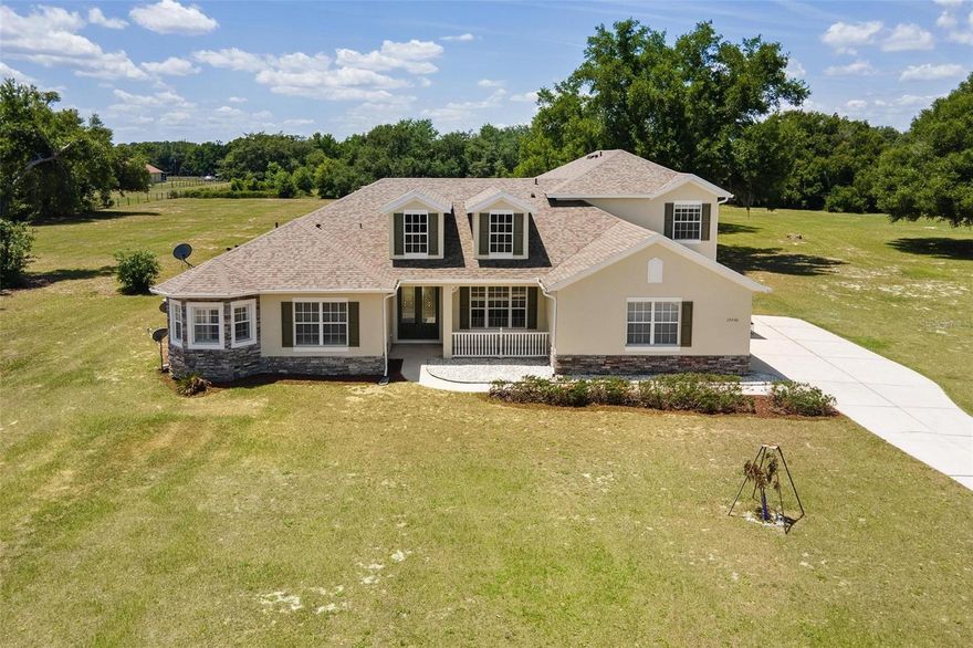 Welcome to your private slice of paradise—where space, comfort, and modern upgrades come together beautifully! Situated on over 8 sprawling acres in a highly desirable area, this impressive estate offers more than 3,900 square feet of living space, featuring 5 spacious bedrooms plus a versatile game room, making it perfect for entertaining, multi-generational living, or simply enjoying room to spread out.
From the moment you arrive, you’ll appreciate the sense of freedom that comes with owning a property of this size and with NO HOA, you have the flexibility to truly make it your own. Whether you envision bringing your toys, adding a workshop, or just enjoying wide-open space, the possibilities here are endless. Inside, the home has been thoughtfully updated with modern finishes and many upgraded improvements, giving you peace of mind and move-in-ready convenience. NEW ROOF 2025!! Recent upgrades include brand-new AC units April 2026, ensuring year-round comfort, along with stylish LVP flooring, fresh carpet, and a completely refreshed interior and exterior paint scheme that gives the home a crisp, contemporary feel. The bathrooms have been beautifully upgraded with elegant quartz countertops, complemented by new toilets and updated plumbing fixtures adding a touch of luxury to your everyday routine. Every detail has been carefully considered to blend functionality with modern design. All new blown in insulation done recently as well. The expansive floor plan offers multiple living areas, ideal for hosting gatherings or creating cozy retreats throughout the home. The large game room is a standout feature—perfect for movie nights, a pool table, or a home gym setup. Step outside and take in the beauty of your acreage—plenty of room for outdoor entertaining, gardening, animals, or simply enjoying the peaceful surroundings. With this much land, you get the rare combination of privacy and convenience in a sought-after location. This is more than just a home, it’s a lifestyle opportunity. Spacious, updated, and set on a stunning parcel of land, this property is a must-see for anyone looking to enjoy country-style living without sacrificing modern comforts.
Schedule your private showing today and experience everything this exceptional property has to offer!