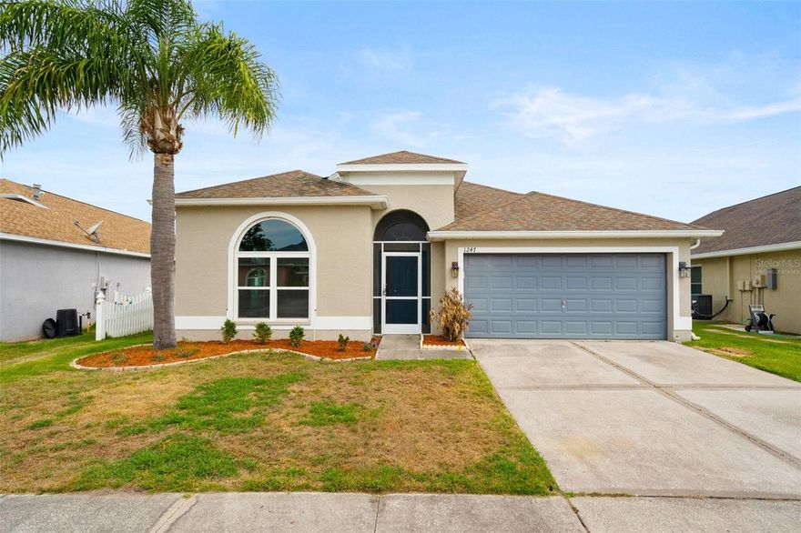 One or more photo(s) has been virtually staged. Prepare to fall in love with this exquisite 4 bedroom, 2.5 bathroom pool home in the boating community of Lakeview Village. The home has been recently updated with new paint, cabinets, granite countertops and windows. Enter through the screened porch to the front door, where wood-like flooring greets you and continues throughout the open floor plan. The kitchen boasts new stainless steel dishwasher, microwave and a new gas stove/oven, new granite countertops and breakfast bar seating. Find rest in the primary bedroom showcasing an expansive closet and an en suite bathroom featuring a soaking tub and a luxury tile shower. Unwind after a long day and take in water views on the covered patio and an enclosed pool for enjoyment. Enjoy community amenities that include walking paths, a community park, and a picnic pavilion. This home is conveniently located minutes from I-75, shopping, dining, and recreation.  *Some photographs have been virtually staged*