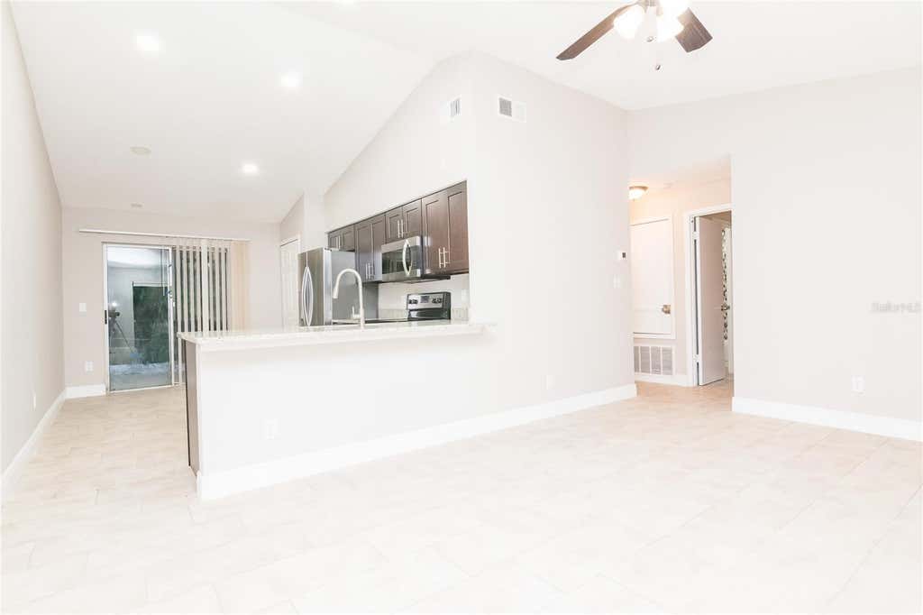 Photo of 1848 Bonneville Drive, Orlando, FL 32826 (MLS # O6427720)