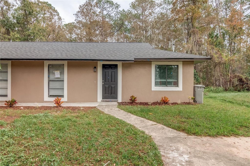 Photo of 1848 Bonneville Drive, Orlando, FL 32826 (MLS # O6427720)