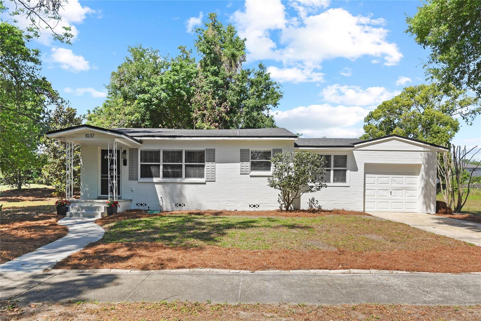 THE best kept secret in WP! Newly renovated charming bungalow located directly on famed 4th Fairway on WP9 – Winter Park Golf Course! Quiet, private & secluded setting with gorgeous views on dead end street. Walk or bike to Park Avenue, dining and shopping, Rollins College and Winter Park Village. New roof and water heater 2023, refinished hardwood floors, new kitchen with stainless appliances, renovated bath, 3 generous bedrooms, bonus Florida Room, PLUS single car garage. Open patio in backyard with separate firepit seating area with twinkle lights overlooking the golf course. Great rental and/or build your dream home! Don’t miss this “one of kind – live your best Winter Park life” opportunity!