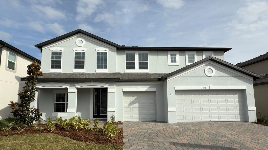 Photo of 32520 Sapna Chime Drive, Wesley Chapel, FL 33545 (MLS # J985409)