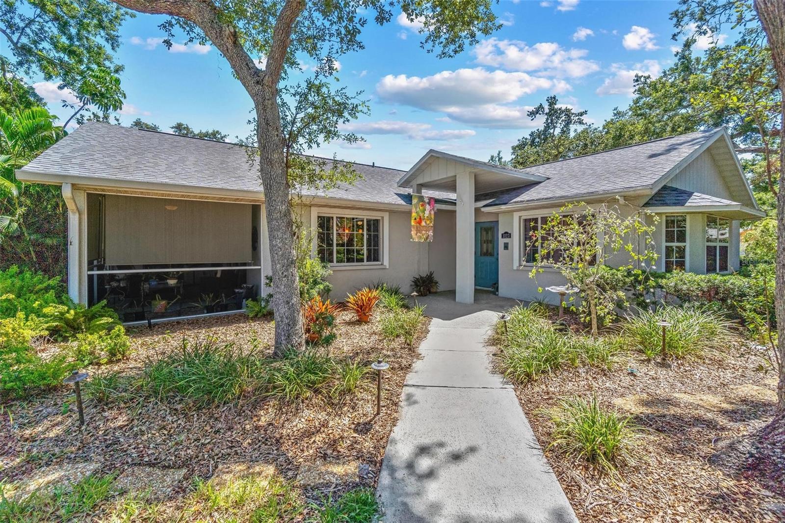 Welcome to your private retreat in NW Bradenton! Perfectly situated on a corner lot leading into a cul-de-sac, this home offers a wonderfully serene and private setting surrounded by lush landscaping and mature shade trees. Step inside to an open, light-filled floor plan with high ceilings, creating an inviting and airy atmosphere. The kitchen features a convenient breakfast bar and nook, perfect for morning coffee or casual dining, while the split floor plan offers a spacious master suite for your comfort. Enjoy the large laundry room with utility sink and direct garage access for added functionality. The screened lanai provides a relaxing space to enjoy the natural surroundings year-round. Roof replaced in 2017, windows updated in 2016 and 2017 for peace of mind. Located in a quiet neighborhood with quick access to shopping and dining, and just minutes from Robinson Preserve with its trails, kayak launch, and picnic areas, and the beautiful Gulf beaches. Don’t miss the opportunity to live close to nature while enjoying the convenience of Florida living.