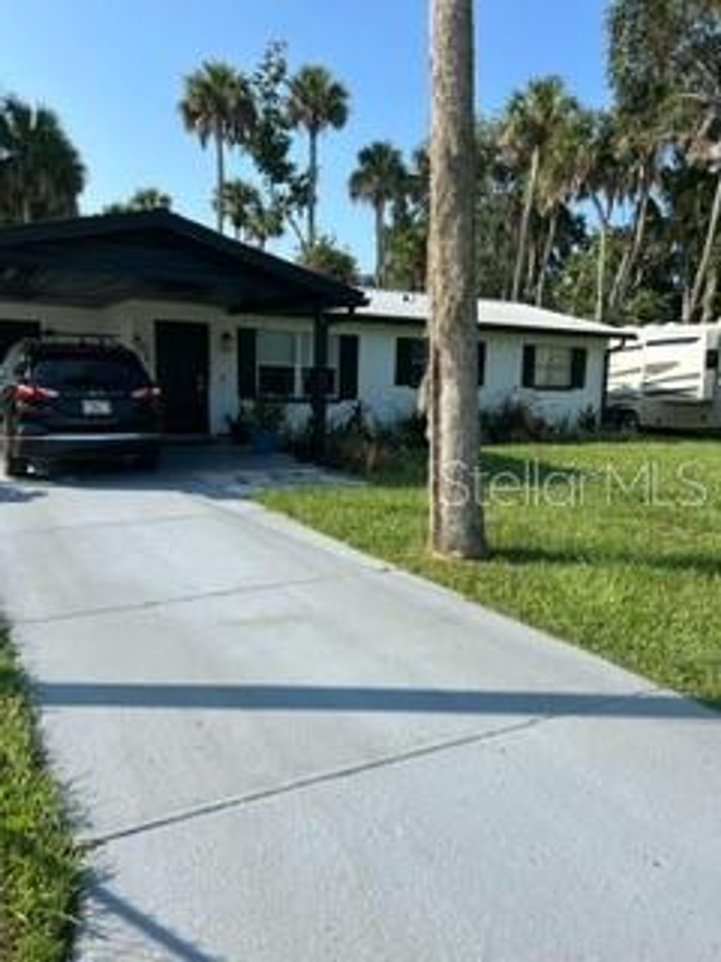 Photo of 901 Roper Street, New Smyrna Beach, FL 32168 (MLS # O6371849)