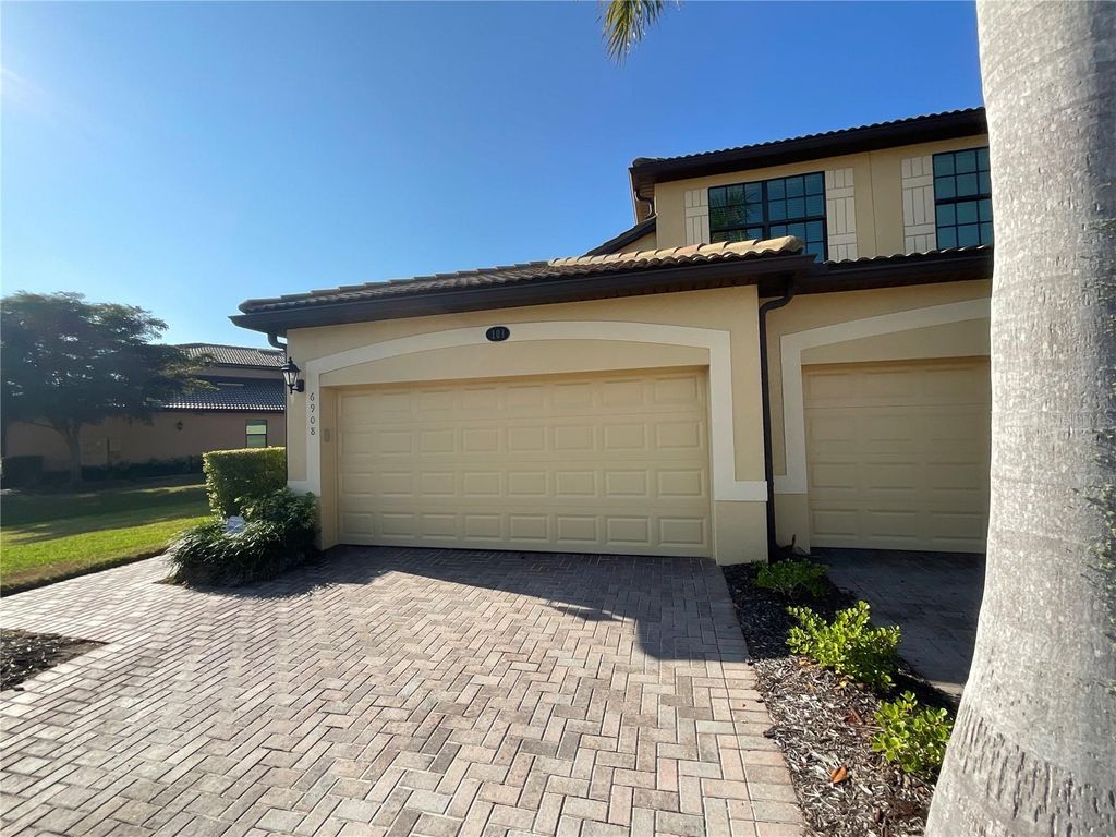 Photo of 6908 Grand Estuary Trail #101, Bradenton, FL 34212 (MLS # A4673041)