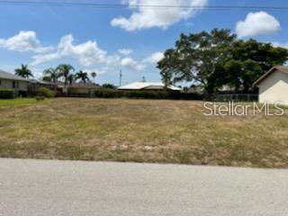 Cape Coral lot centrally located in an established residential neighborhood. No HOA. Build your dream home in this beautiful lot!!! Close to schools, parks, shopping, restaurants, soccer field and Lotus canal. Assessments are paid in full. Water, electricity and sewer available. Go direct to vacant lot.
