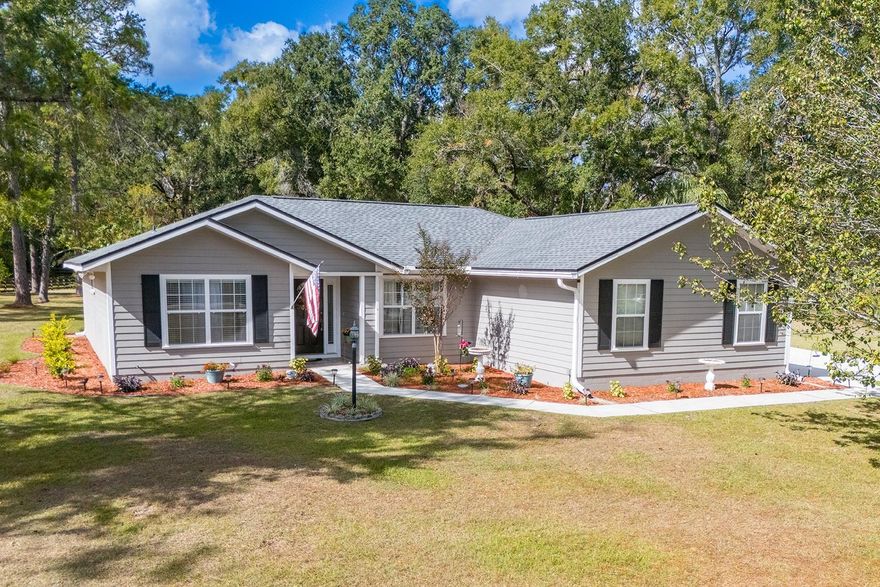 Welcome to this charming 3-bedroom, 2-bath home located in the highly sought-after Edgemoor neighborhood of High Springs, FL. Situated on a quiet back street, this property offers exceptional peace and privacy with a beautiful tree-lined lot, no neighbors behind, and generous spacing between side neighbors. Edgemoor also features a low HOA, adding even more value to this desirable location. The home sits on over an acre lot with huge back yard, perfect for family gatherings, outdoor entertaining, and providing a wonderful play area for children. You’ll enjoy an abundance of local wildlife, giving the property a peaceful, natural feel. This home has been thoughtfully maintained with major updates already completed. The exterior was freshly painted in April 2021, the roof was replaced in August 2022, the AC was updated in 2018, and the septic was pumped in 2022—offering comfort and peace of mind for years to come. Fresh new landscaping adds to the home’s welcoming curb appeal. Enjoy the convenience of being just a 5-minute walk to Memorial Park, less than 10 minutes to the area’s stunning springs, and only a couple miles from the Santa Fe River and nearby boat launch. The location is ideal, sitting halfway between High Springs and Alachua and just 3 miles from I-75 exit 399, making for an easy commute to Gainesville. This home is priced to sell and won’t last long—schedule your showing today!