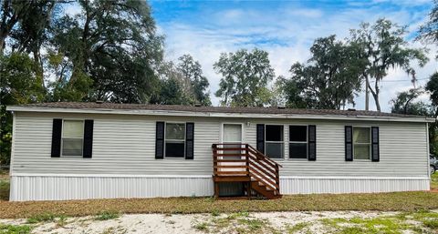 Photo of 1875 NE 128th Place, Anthony, FL 32617 (MLS # OM716051)