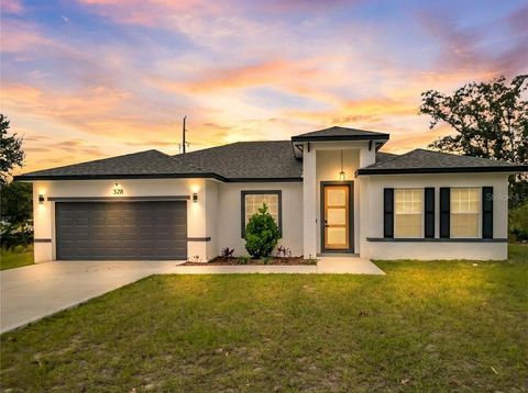 Photo of 328 Marion Oaks Crse, Ocala, FL 34473 (MLS # O6368759)