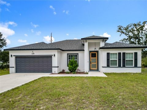 Photo of 328 Marion Oaks Crse, Ocala, FL 34473 (MLS # O6368759)
