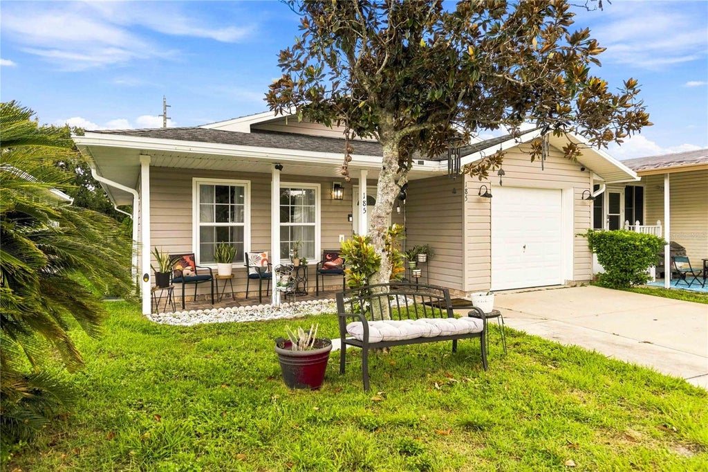 Photo of 50989 Highway 27 #185, Davenport, FL 33897 (MLS # O6439721)