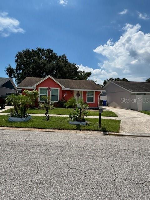 BEAUTIFUL 3 BEDROOMS, 2 BATHROOMS SINGLE FAMILY HOME CENTRALLY LOCATED IN TOWN N COUNTRY. THIS HOME INTERIOR/EXTERIOR WAS RECENTLY PAINTED. ALSO, THE KITCHEN WAS RECENTLY RENOVATED WITH NEW STAINLESS-STEEL APPLIANCES...REFRIGERATOR, MICROWAVE, DISHWASHER, GLASS TOP RANGE WITH STAINLESS STEEL HOOD VENT WHICH IS VENTED TO THE OUTSIDE OF THE HOUSE, TWO COMPARTMENTS SINK AND FAUCET. ALSO, GRANITE COUNTERTOPS AND TILE FLOORING. AS YOU ENTER THE TILED LIVING ROOM, YOU'LL NOTICE THE HIGH CATEDRAL CEILING. THERE IS A HUGE FAMILY ROOM WHICH CAN BE USE FOR AN OFFICE/DEN OR A 4TH BEDROOM. THE GUEST BATHROOM WAS RECENTLY RONOVATED WITH A WALK-IN SHOWER AND VANITY SINK. THE PRIMARY BEDROOM HAS 2 LARGE WINDOWS, A WALK-IN SHOWER AND A VANITY SINK. THE YARD IS FENCED WITH WHITE PVC FENCING AND WOOD FENCING. THE LONG DRIVEWAY CAN ACCOMODATE SEVERAL VEHICLES. ALSO, THERE'S A GATED AND COVERED PATIO FOR OUTDOOR ENTERTAINING WITH SECURITY LIGHTING. THE SPACIOUS BACKYARD ALSO HAS A WOODEN STORAGE SHED FOR YOUR CONVENIENCE AND ADDITIONAL STORAGE. THE ROOF IS ABOUT 7 YEARS OLD AND THE WATER SOFTENER IS OWNED AND RECENTLY INSTALLED. THIS HOME IS LOCATED NEAR SCHOOLS, SHOPPING, MAJOR HIGHWAYS, HOSPITALS, TAMPA INTERNATIONAL AIRPORT, BEACHES AND DOWNTOWN TAMPA. GREAT OPPORTUNITY FOR AN INVESTMENT PROPERTY OR AIRBNB.
