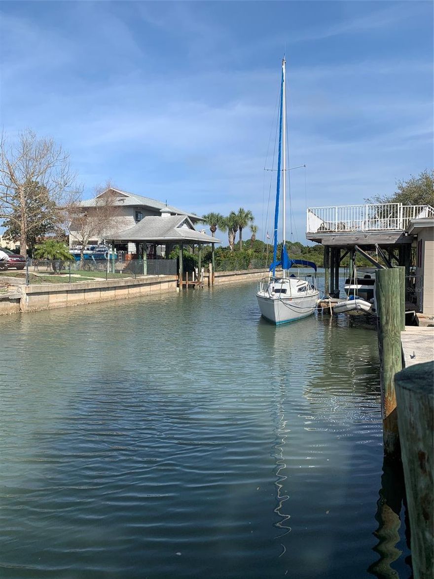 This gorgeous waterfront lot on a deep water canal is waiting for you to come build your dream home, just 2 lots away from the Intracoastal waterway.  The 42-foot seawall (built 2007) with water and electrical service, and just steps from your concrete boat ramp. City water, sewer, and electrical service are already available on site. ;Water: Available at Site