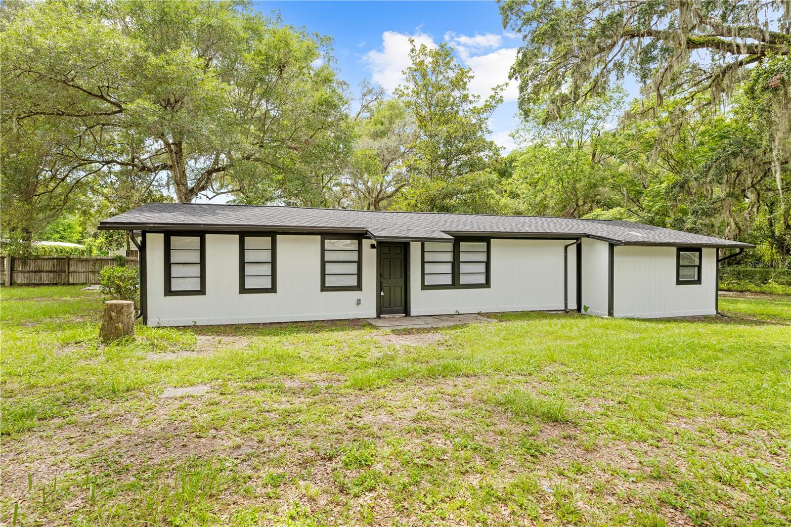 NEW ROOF!! NEW HVAC!! NEW WATER HEATER!! USDA eligible with no money down, ask about our preferred lender!! Welcome to 21343 Beasley Road — a move-in ready 3-bedroom, 1-bath home offering space, upgrades, and flexibility. On 0.69 acres in peaceful Brooksville, this charming property has been thoughtfully updated in 2025 including a brand-new roof, new HVAC system, and new water heater!! Inside, you'll find a clean and functional layout with a den area (perfect as a family room or home office) and a convenient indoor laundry closet tucked neatly within the space. The main living area flows into a newly renovated kitchen with a bar and breakfast nook area. Step outside to enjoy your spacious lot complete with a 3-bay pole barn equipped with electric hookups — ideal for a workshop, storing equipment, or housing recreational vehicles. Roof and HVAC warranties are transferrable! Whether you're a hobbyist, need space for tools or toys, or just want more freedom to spread out, this property offers it all. Located in a quiet, country-style setting with no HOA or deed restrictions, this home offers true Florida freedom. You're just minutes from historic downtown Brooksville, known for its quaint shops, local dining, art walks, and weekend festivals. Outdoor lovers will appreciate the proximity to Croom Forest, Withlacoochee State Trail, and Chinsegut Hill, all offering incredible trails, nature preserves, and opportunities to explore Florida’s natural beauty. With quick access to US-41, SR-50, and I-75, commuting to Spring Hill, Tampa, or the Gulf Coast is a breeze. This one has all the must-haves — land, updates, and versatile space. Schedule your private tour today!!