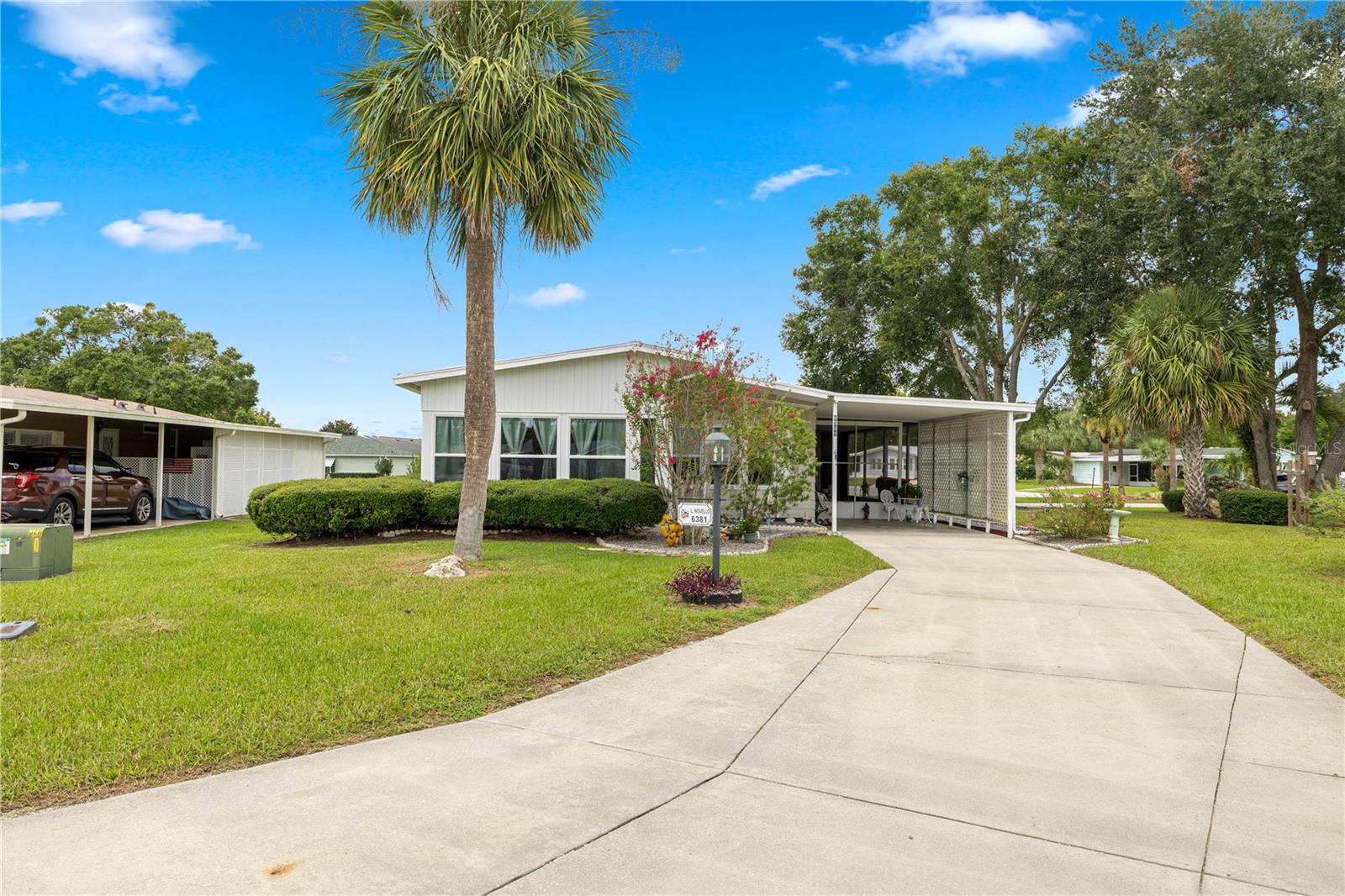 Marion Landing home conveniently located between the Member office and Amenities center on a large cul-de-sac lot . This home is move in ready with a 7 year old roof, double paned windows, closed in front porch which is now livable. Plumbing behind sinks and behind washer has been updated, newer fans, and appliances, HVAC is 2020, and comfort seat toilets are all features that come with this home, and Fiber is currently being run in the neighborhood. This home has ease of living and all the conveniences of shopping, restaurants, and medical within miles of the home. Call for a viewing.