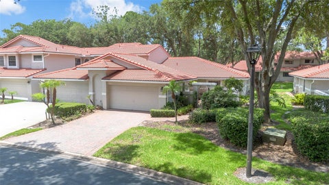 Photo of 8237 Breeze Cove Lane, Orlando, FL 32819 (MLS # O6413667)