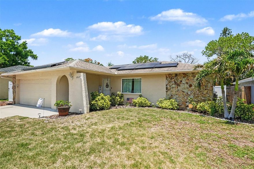 The home is also equipped with hurricane-grade windows by Pell and 3rd nail roof straps for peace of mind! Welcome to your private oasis at 2627 Surrey Drive, a beautifully maintained 4-bedroom, 2-bathroom single-family POOL home offering the ultimate Florida lifestyle with NO KNOWN HOA fees in a quiet neighborhood. Inside, the spacious open floor plan blends durable tile and laminate flooring with modern updates, including stainless steel kitchen appliances, custom stone-accented bathrooms, and a massive bonus den that easily transforms into a home office or game room. Step outside into a spectacular, fully screened lanai featuring a patio and a sparkling in-ground pool. Beyond the property line, you are minutes from world-class coastal recreation, including the pristine white sands of Honeymoon Island and Caladesi Island, the championship golf courses at Innisbrook Resort, and the scenic trails at Wall Springs Park. You are also close to the vibrant dining at the historic Tarpon Springs Sponge Docks, and an easy 30-to-35-minute commute to both St. Pete-Clearwater and Tampa International Airports. Come see this home today!