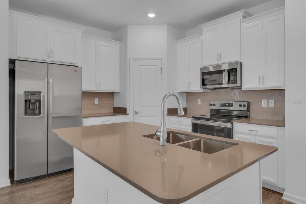 Photo of 1715 Happiness Row, Kissimmee, FL 34744 (MLS # S5142449)