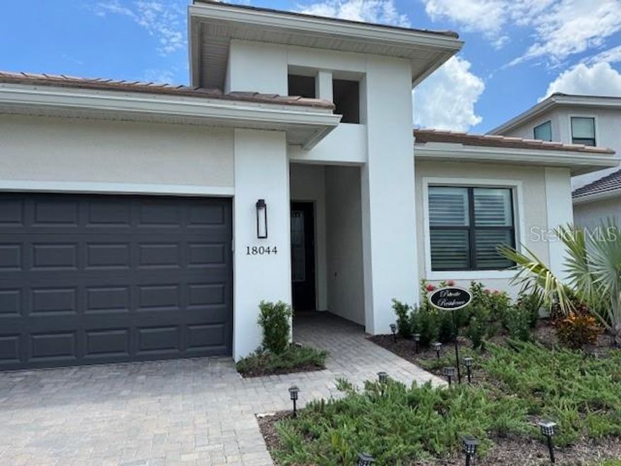 2 Bed ,2 Bath plus Den, Unfurnished Annual Rental . Offered in the new gated 55+ Cresswind  community in Lakewood Ranch.
Open floor plan featuring a beautiful lake view . Spilt floorplan with guest bed and bath in the front and the Master suite situated in the back. 
Beautiful Office/Den with glass French doors. The modern open Kitchen opens to the spacious Dining ,Living area. 
The Master suite has a beautiful en-suite bath area with 2 vanities ,a large glass walk-in shower and a large walk-in closet.
A large screened -in Lanai overlooks the lake and peaceful surroundings. 
A custom Laundry Room with cabinets and sink, and a 2 car garage (with Tesla charging outlet)and smart garage door complete this wonderful home. Security system in place ready to be activated. 
Landscaping,outdoor pest control, Internet and Cable included 
Cresswind is an active over 55 community .Full (no fee) access to the gorgeous clubhouse with beverage center , state of the art Fitness Center, an art room ,gathering/game room, 3 pools (resistance ,lap and full pool) a spa, plus Tennis, Pickle Ball and Bocce courts and a dog park for your furry friend.
A full time Lifestyle Director designs a calendar of social activities especially for the 55+ residents to take advantage of in this active community.
A small dog is allowed at the owners discretion with a Non-refundable pet fee.