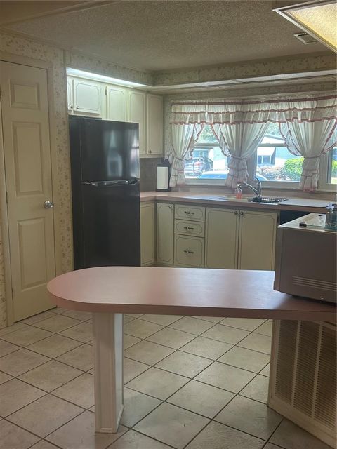 Tiny photo for 1708 Lilly Lane, Lady Lake, FL 32159 (MLS # G5114150)