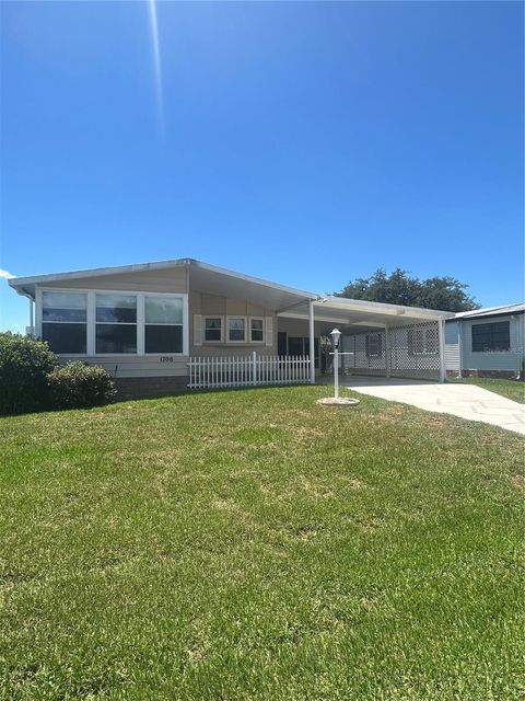 Photo of 1708 Lilly Lane, Lady Lake, FL 32159 (MLS # G5114150)