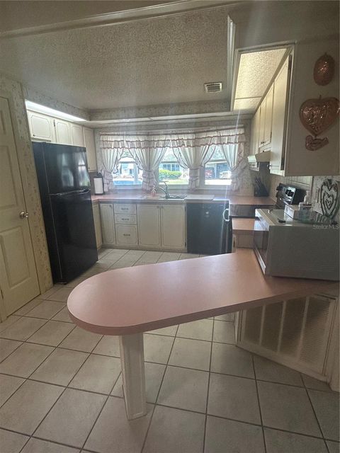 Tiny photo for 1708 Lilly Lane, Lady Lake, FL 32159 (MLS # G5114150)