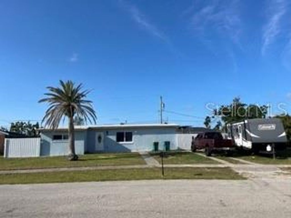 Photo of 700 Floral Lane, Port Charlotte, FL 33952 (MLS # D6142743)