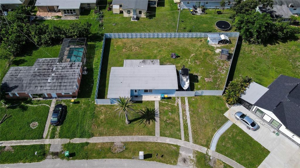 Photo of 700 Floral Lane, Port Charlotte, FL 33952 (MLS # D6142743)