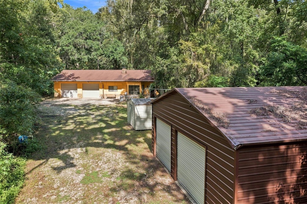 Photo of 16205 Perimeter Drive, Brooksville, FL 34614 (MLS # W7889065)