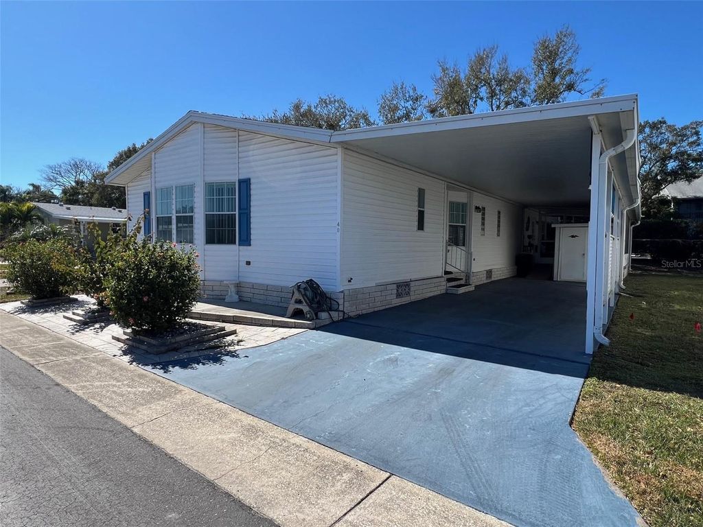 Photo of 11300 124th Avenue #40, Largo, FL 33778 (MLS # TB8472883)