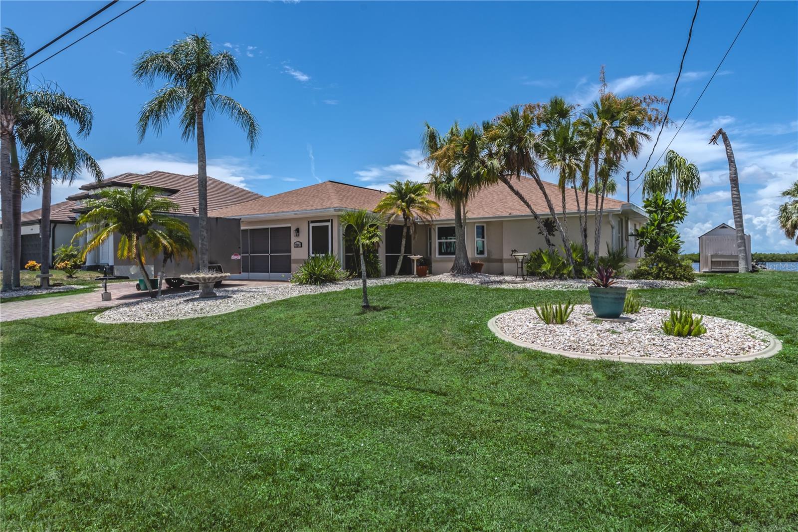***MOTIVATED SELLER*** Welcome to your dream home in a boater's paradise! This beautiful 3-bedroom, 2-bathroom oasis boasts an incredible view and direct canal access to Port Charlotte Harbor. Dive into relaxation with your private pool, or set sail from your very own boat dock and deck. The home is fully furnished with tasteful decor, ready for you to move in and start living the waterfront lifestyle. Newly installed Impact windows with life time warranty. Home is also being offered with a Home Warranty. Enjoy peace of mind with recently installed impact windows, ensuring safety and energy efficiency. Don't miss the chance to own this slice of paradise!