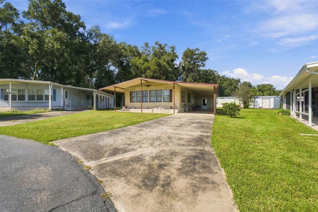 Photo of 39353 Sycamore Lane, Zephyrhills, FL 33542 (MLS # TB8560416)