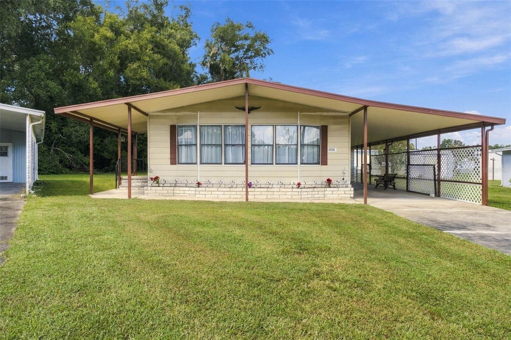 Photo of 39353 Sycamore Lane, Zephyrhills, FL 33542 (MLS # TB8560416)