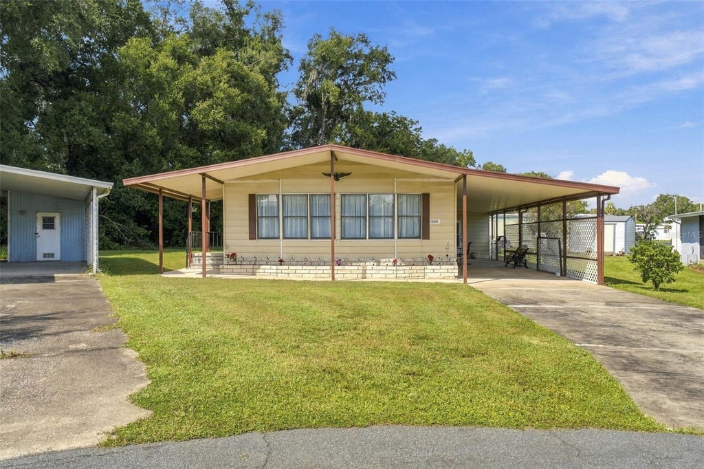 Photo of 39353 Sycamore Lane, Zephyrhills, FL 33542 (MLS # TB8560416)