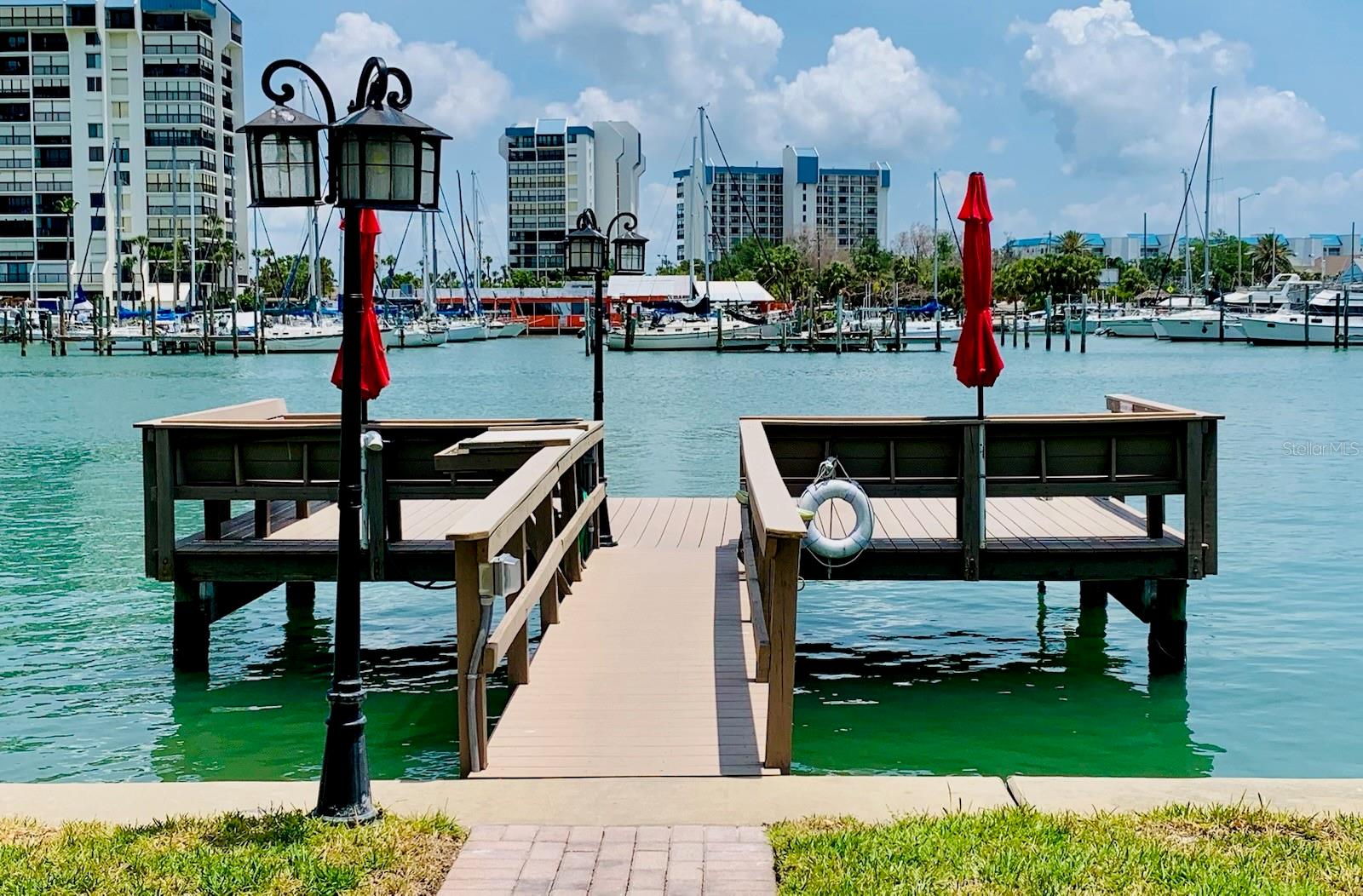 Beautifully updated and Fully Furnished condo just steps to the sand!! Treasure Island Getaway one block from the beach. One bedroom one bath condo on the first floor with assigned parking next to front door. Well designed Kitchen with custom cabinets and granite countertops, brand new appliances with Built in Microwave. Porcelain tile flooring throughout!! No steps to climb. Amenities include Water Front complex, Dock to fish or day park your boat, Block construction, Laundry room close to unit. Water, sewage, trash, included with rent.
