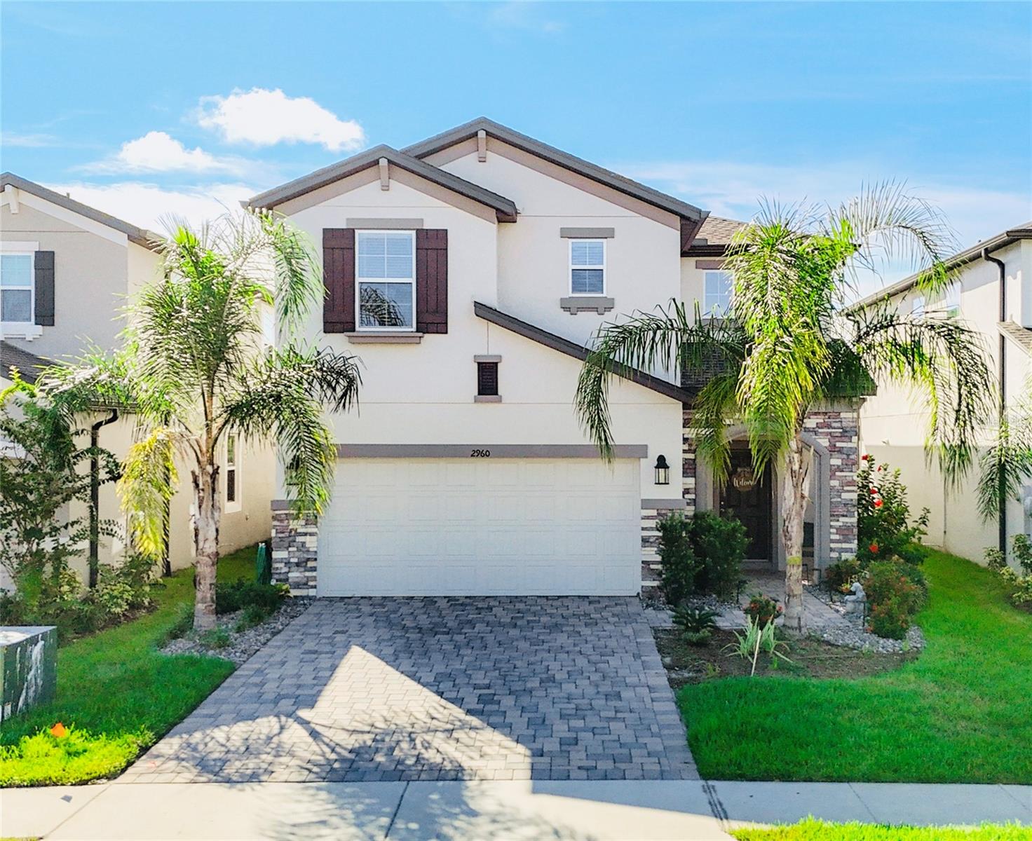 Discover modern comfort and exceptional value in this spacious 2,585 sq ft, 2022-built single-family home located in the desirable Cobblestone community by M/I Homes. This inviting residence offers 3 baths, thoughtful open-concept living, and contemporary finishes throughout. Situated in East Pasco County, it combines the tranquility of suburban living with convenient access to major roadways, shopping, entertainment, and dining. Enjoy the community’s planned amenities and the attractive pricing offered in this fast-growing neighborhood. This is a great opportunity to lock in a like-new home in a thriving, well-located community—don’t miss it!