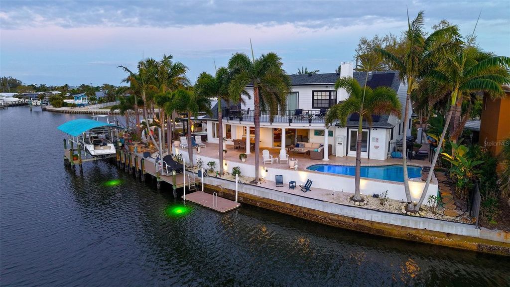 Photo of 10432 Spoonbill Road W, Bradenton, FL 34209 (MLS # A4685479)